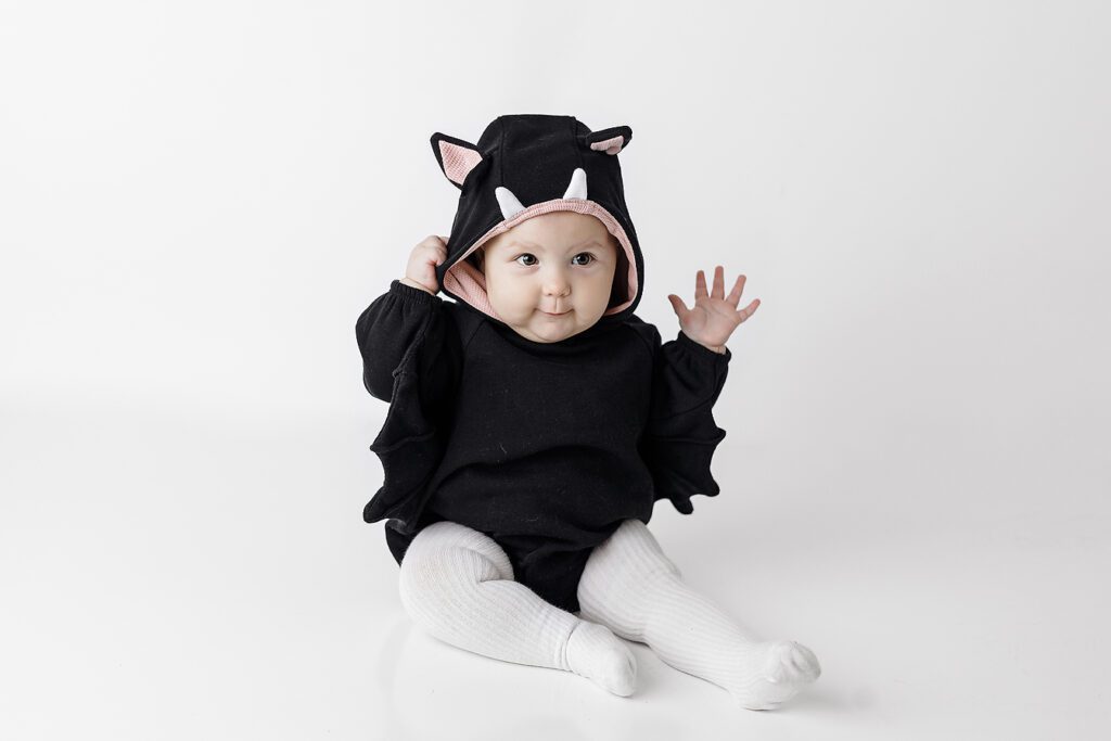 baby wearing bat costume