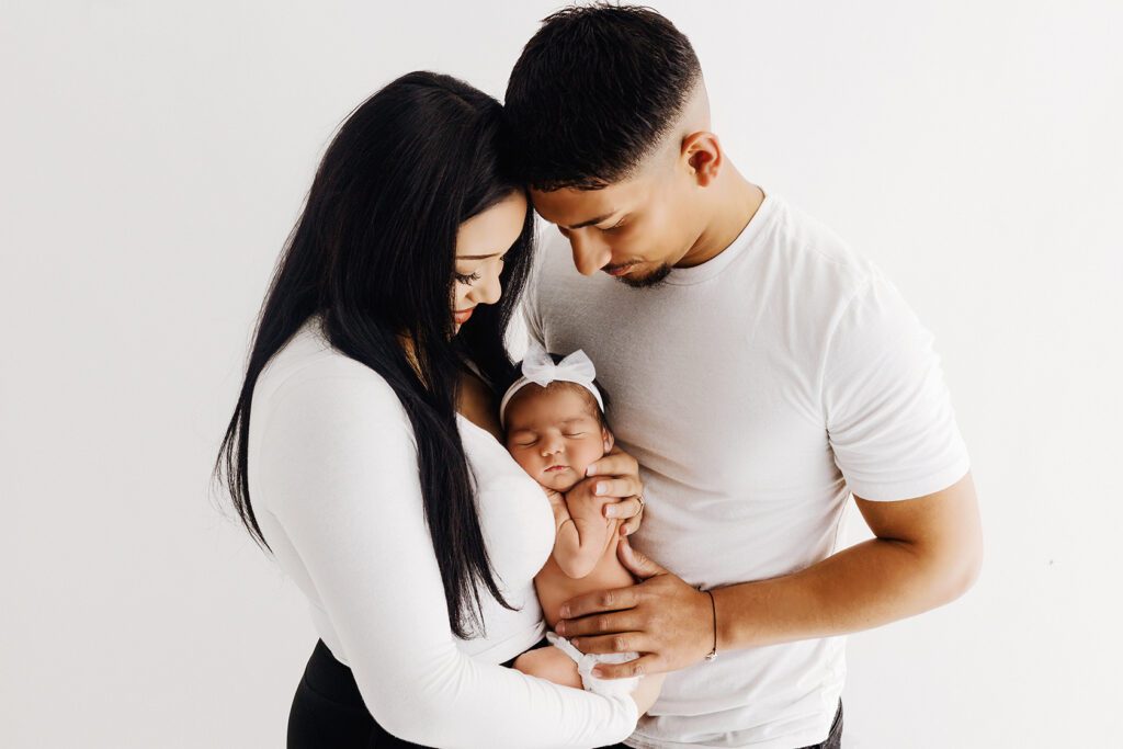 new parents with baby girl